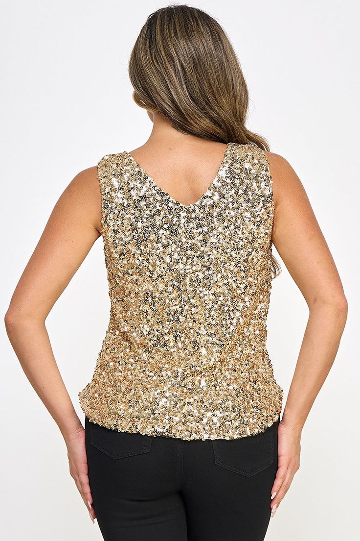 This luxurious gold sequin sleeveless top is perfect for showcasing your style during any special event. The sequins add a touch of sparkle and shine to your outfit that will have everyone looking your way. Perfect for the holidays, this top will elevate your look. Model measurements Model is wearing size Small Height: 5'9.5" Bust: 33 Waist: 25 Hip: 34 Fabric Contents 97% Polyester 3% Spandex Imported Size Chart XS = Dress 0-2, Bust, 31"-32.5", Waist 23"-24, Hip 31"- 34"Small = Dress 4-6, Bust,3 Gold Embellished Sleeveless Sequin Dress, Gold Sleeveless Sequin Fabric For Party Season, Gold Sequin Fabric For Party Season, Festive Sleeveless Sequin Dress With Contrast, Festive Sleeveless Dress With Contrast Sequins, Gold Sparkling Sleeveless Sequin Dress, Glamorous Shimmer Top For Holidays, Sparkling Tops For Party Season, Glamorous Contrast Sequin Tops For Holidays