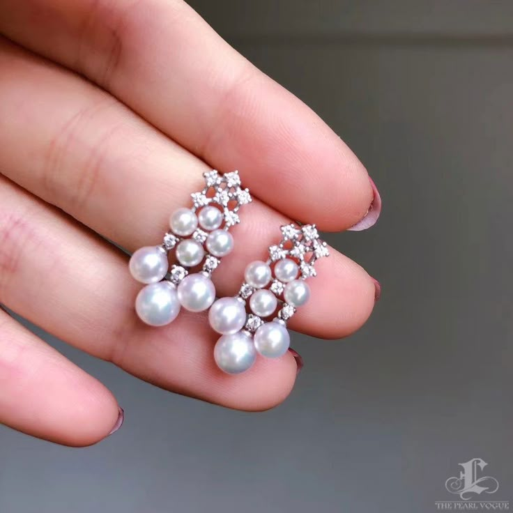 Highlight: Exquisite and Elegant Style Product Information OriginJapan MaterialAkoya Pearl, 18k Gold, and Diamond Dimensions2.0 x 1.1 cm Pearl Shaped: Round Size: 3-4.5 mm Quality: AAA Nacre: Very Thick Color: White Luster: Aurora Accessories Metal: 2.3 g of 18k White Gold Other: 0.42 ct of SI Quality Natural Diamond Including With Your Purchase: 30-Day Money-Back Guarantee Company Certificate Exquisite Gift Box Pearl Earrings Designs, Pearl Chandelier Earrings, Akoya Pearl Earrings, The Bling Ring, Diamond Earrings Design, Antique Gold Jewelry, Pearl And Diamond Earrings, Diamond Jewelry Designs, Jewelry Design Earrings