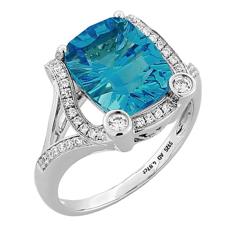 Beautiful Swiss-Blue Topaz ring accented by forty-one brilliant-cut round Diamonds, extending to shank, weighing approx. 0.60 ct., Concave Cushion facet-cut Swiss-Blue Topaz measures approx. 11mmx9mm, approx. weight 5.16 ct.; mounted in 14k white gold with open gallery. Ring size: 7+. A Chic complement to your outfit! Heart Shaped Wedding Rings, Swiss Blue Topaz Ring, Rings Antique, Real Gold Jewelry, Gold Solitaire Ring, Fine Diamond Jewelry, Colorless Diamond, Custom Ring Designs, Custom Ring