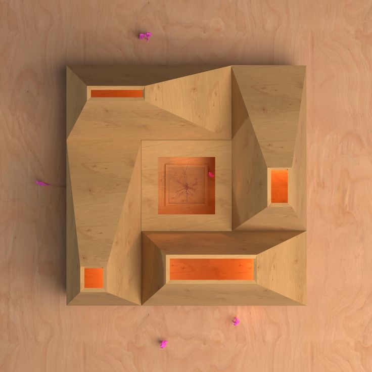 an overhead view of a wooden object with holes in it