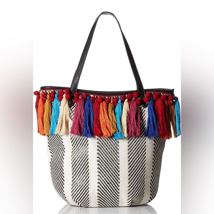 Clyde Canvas Tote With Pom Poms And Yarn Tassel Embroidery, Double Flat Handles Pockets: 2 Interior Slip, 1 Interior Zip Closure Type: Zipper Fringe Tassel Accents Tassel Embroidery, Round Straw Bag, Fringe Tote Bag, Hobo Tote Bag, Knitting Tote, Satchel Tote Bag, Carryall Tote, Red Tote, Vegan Leather Tote