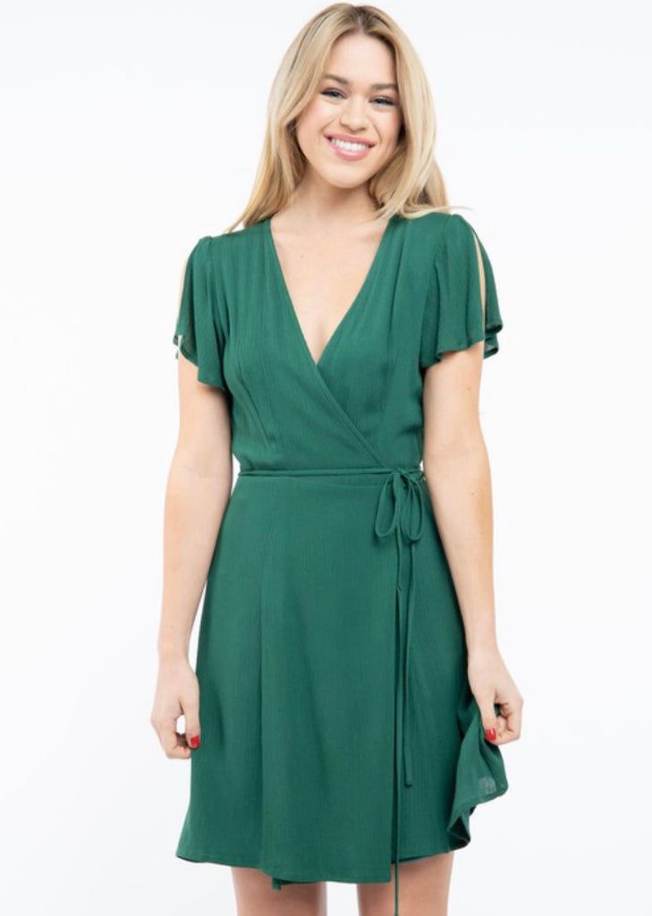 Sweet Celebrations Emerald Green Wrap Dress (More Colors) Green Dress With Tie Waist And Surplice Neckline, Green Surplice Neckline Dress With Tie Waist, Green Surplice Neckline Midi Dress For Date Night, Green Midi Dress With Surplice Neckline For Date Night, Green V-neck Wrap Dress With Tie Waist, Green Midi Dress With Tie Waist And Surplice Neckline, Green Wrap Dress With Surplice Neckline For Party, Green Faux Wrap Dress, Green Surplice Neckline Wrap Dress For Party