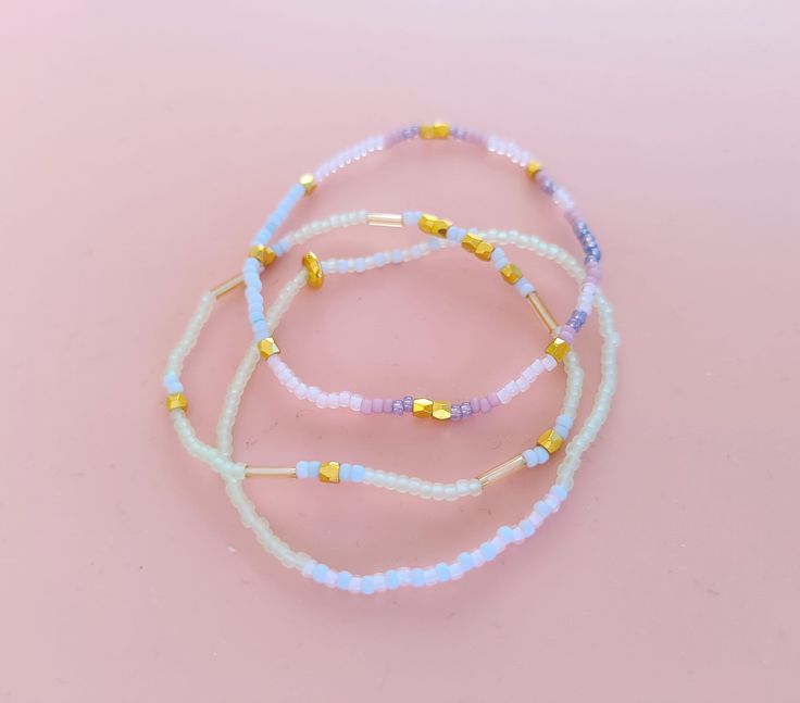 Dainty Beaded Stackable Bracelets in pastel tones, select one two or three stretch bracelet Toho seed beads and cooper beads Pastel Stretch Bracelet With Colorful Beads As Gift, Pastel Beaded Stretch Bracelet As Gift, Pastel Beaded Stretch Bracelet Gift, Pastel Beaded Stretch Bracelet, Pastel Stretch Bracelet With Round Beads As Gift, Pastel Stretch Bracelet As Gift, Bracelets Etsy, Stackable Bracelets, Bead Bracelets