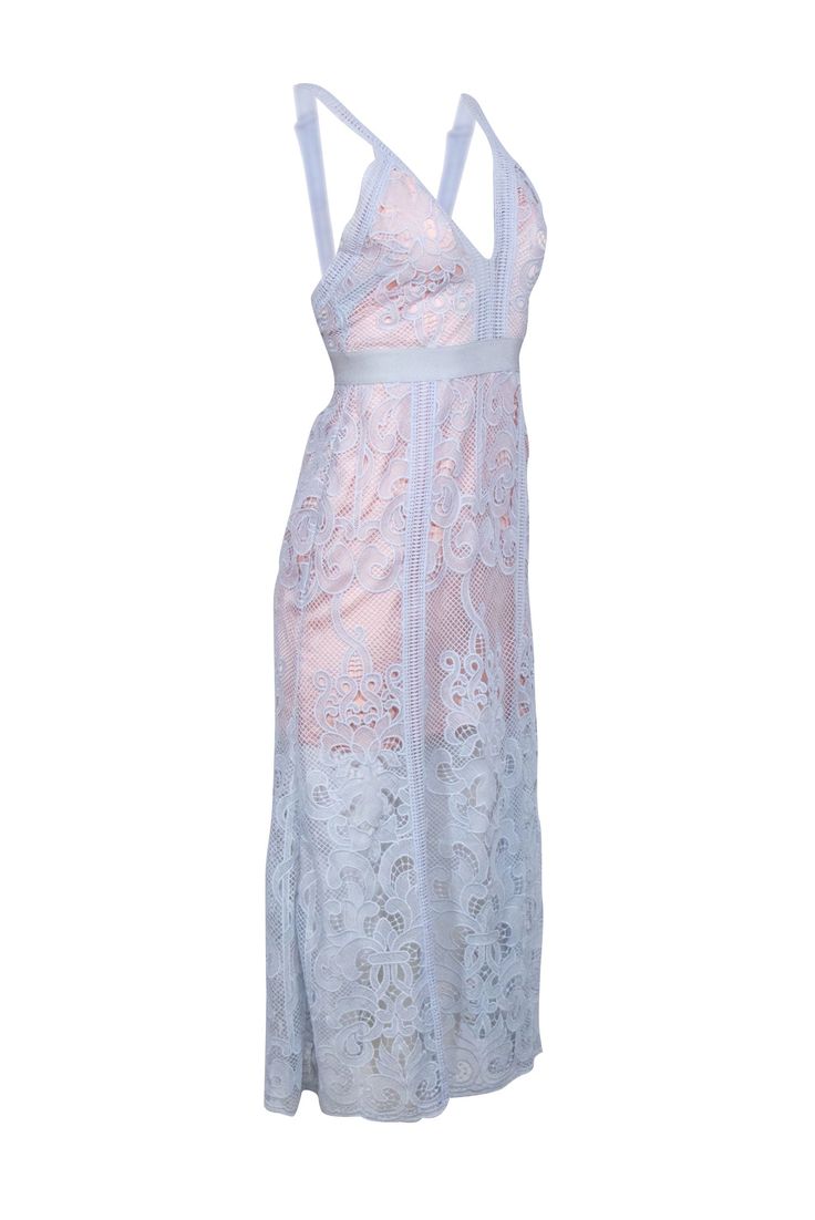 Feel elegant and stylish in the Alice McCall blue lace sleeveless midi dress. This stunning dress features delicate blue lace and a flattering midi length. Perfect for a wedding guest or a night out, pair it with nude heels for a chic look. Size 2 Shell 100% Polyester Lining 97% Polyester, 3% Elastane Contrast trim 100% Cotton Elastic Trim 91% Nylon, 9% Elastane Invisible back zipper O ring sleeveless straps V-neckline Bust 32" Waist 24" Shoulder to hem 50" Blue Lace Dress With Lace Bodice For Spring, Sleeveless Delicate Lace Prom Dress, Delicate Lace Sleeveless Prom Dress, Spring Prom Dress With Delicate Lace, Spring Prom Lace Dress With Delicate Lace, Delicate Lace Dress For Spring Prom, Sleeveless Evening Dress With Delicate Lace, Elegant Sleeveless Lace Maxi Dress, Sleeveless Scalloped Lace Maxi Dress For Party