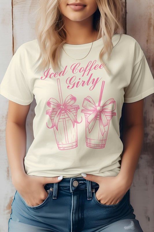 Vintage Ice Coffee Girl Graphic TeeBella Canvas Tees. This item is made entirely from eco-friendly materials. It has a unisex fit that is true to size, with a crew neck and short sleeves. The shirt is crafted from superior combed and ring-spun cotton, with a 32 single 4.2 oz. Weight. It is side-seamed and has a retail fit, with shoulder taping for added comfort. The print is created using high-quality water-based ink, which is eco-friendly and leaves a soft touch on the fabric.Fabric Contents: 1 Casual Coffee-colored Screen Print T-shirt, Casual Coffee Crew Neck T-shirt, Coffee Color Relaxed Fit Short Sleeve T-shirt, Casual Coffee Colored Screen Print T-shirt, Casual Coffee T-shirt With Screen Print, Coffee Color Graphic Tee Shirt With Short Sleeves, Coffee Color Crew Neck Top, Casual Coffee-colored Crew Neck Top, Casual Coffee Short Sleeve T-shirt