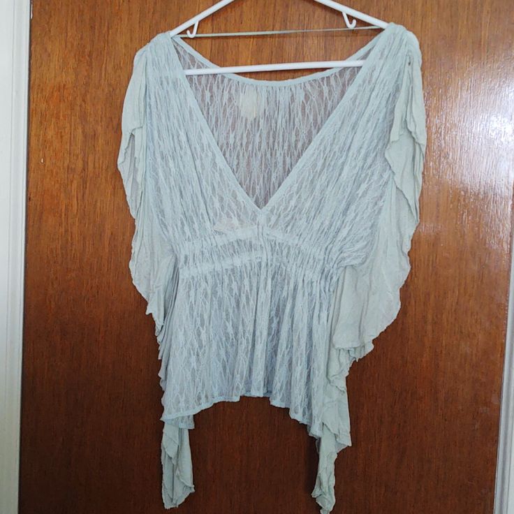 Nwt Free People Lace V-Back Flutter Sleeves Blouse Xs This Blouse Is Absolutely Gorgeous And Sold Out Everywhere! Lace, Light Mint Green Color, V-Back, Flutter Sleeves, And Cinched Waist. Please Let Me Know If You Have Any Questions Feminine Flowy V-neck Top, Summer Beach Blouse With Butterfly Sleeves, Flowy V-neck Spring Blouse, Beach Tops With Ruffles And Flutter Sleeves, Breezy V-neck Summer Top, Summer Tops With Ruffles And Butterfly Sleeves, Flowy Butterfly Sleeve Summer Blouse, Flowy Butterfly Sleeve Blouse For Summer, Summer V-neck Top For Daywear