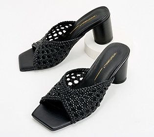 A slide worth stepping into, these heeled mules elevate any outfit with an on-trend woven design. From INTENTIONALLY BLANK. Black Woven Leather Mules For Spring, Casual Square Toe Mules For Evening, Synthetic Woven Leather Block Heels, Elegant Woven Leather Open Toe Mules, Black Woven Leather Heels For Summer, Casual Evening Mules With Padded Heel, Chic Formal Mules With Woven Leather, Chic Formal Woven Leather Mules, Chic Woven Leather Mules For Spring