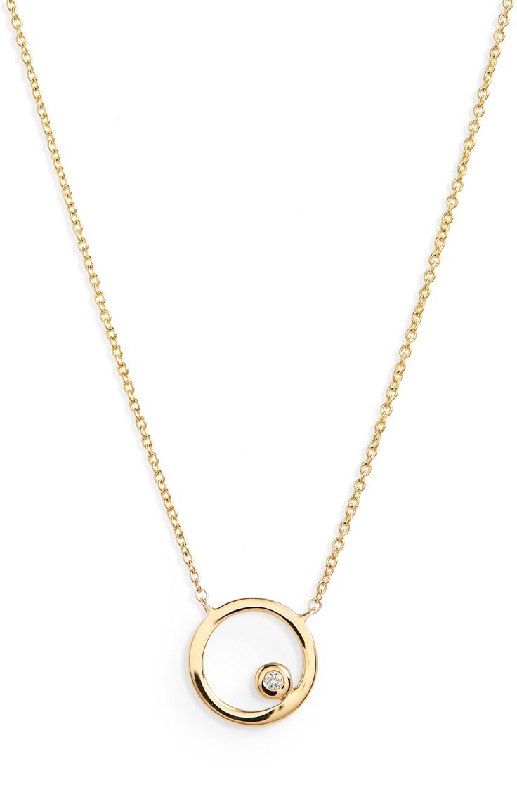 This 14-karat-gold necklace features an open disc pendant glinting with a single bezel-set diamond. 16" length; 2" extender; 1/4" pendant diameter Total diamond weight: 0.01ct. Color: G-H Clarity: SI 14k gold/diamond Imported >Diamond Guide Gold Circular Diamond Necklace, Modern Diamond Necklace With Delicate Chain, Modern Round Diamond Necklace With Adjustable Chain, Modern Yellow Gold Diamond Necklace With Round Pendant, Modern Open Circle Necklace For Formal Occasions, Yellow Gold Open Circle Jewelry With Adjustable Chain, Circle Shaped Yellow Gold Necklace With Adjustable Chain, Gold Circular Necklace With Polished Finish, Classic Open Circle Necklace For Gift