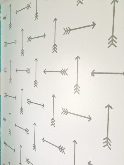 a wall with arrows painted on it