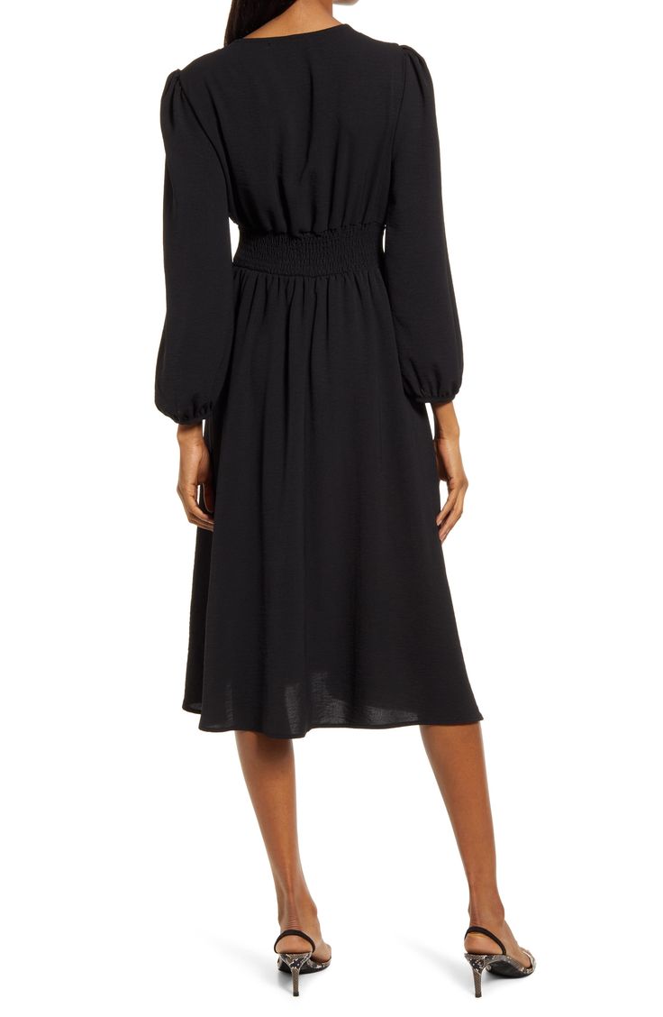 Move gracefully from day to night in this plunge-neck dress styled with puff sleeves and a drapey A-line skirt. 100% polyester Hand wash, line dry Made in the USA of imported fabric Evening Midi Dress With Blouson Sleeves For Fall, Fall Evening Midi Dress With Blouson Sleeves, Elegant V-neck Midi Dress With Elastic Waistband, Solid V-neck Midi Dress With Smocked Back, Fitted Black Dress With Elastic Waistband, Chic Knee-length V-neck Dress With Gathered Sleeves, Fall V-neck Ruched Midi Dress, Evening V-neck Midi Dress With Fitted Waist, Flowy Midi Dress With Elastic Sleeves And V-neck