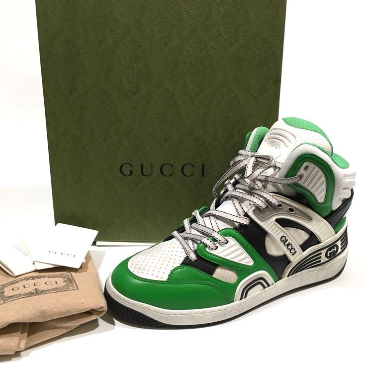 Authentic Gucci “Basket” Sneakers -Model: 661301 -Color: White / Green / Black -Size: Men Us 8.5 / Gucci Size 8 -New With Original Box Details: -Composition: Calf Leather -Rubber Panels -Fabric Lining -Leather Insole -Rubber Sole -Perforated Detail -Side Logo Detail -The Rubber Sole Has A Purposely Worn Look. -Original Gucci Box And Dust Bag Included -Made In Italy === Pictures In This Listing Are From The Actual Item You Would Be Purchasing. Please Refer To Them For Details=== All My Items Are Gucci Sporty High-top Sneakers, Designer White High-top Sneakers With Logo, Designer White Sneakers With Logo, Custom White High-top Sneakers With Logo Detail, Gucci High-top Logo Sneakers, Gucci High-top Sneakers With Logo, Gucci High-top Lace-up Sneakers With Logo, Gucci Lace-up High-top Sneakers With Logo Detail, Luxury High-top Custom Sneakers With Logo