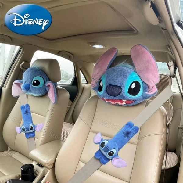 two stuffed animals sit in the back seats of a car with matching headrests