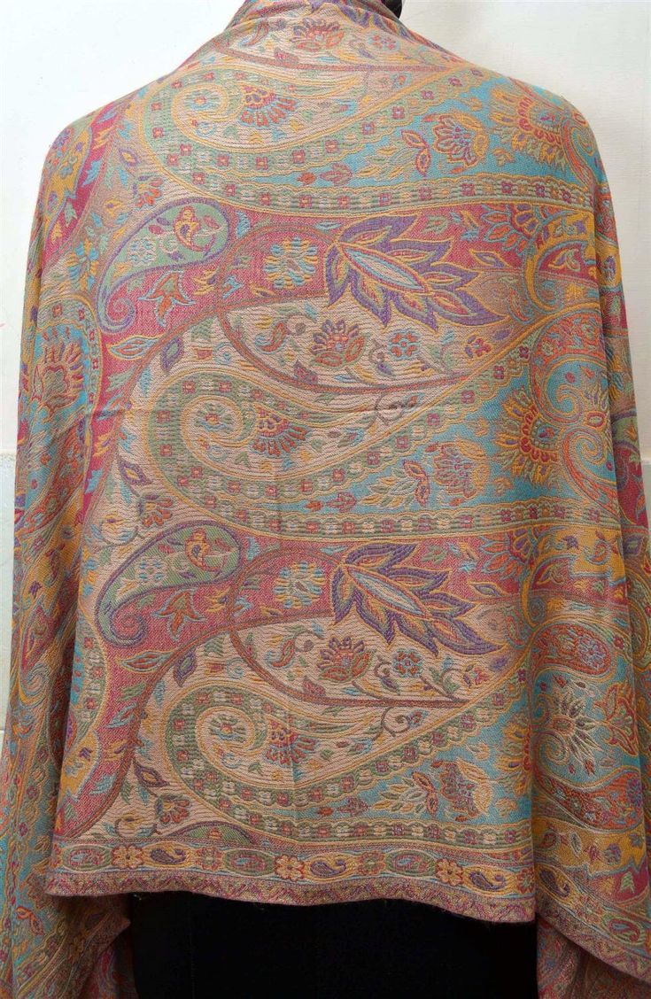 A pashmina scarf of the highest quality made from 100% pure silk in harmoniously coordinated colors. Tradition is combined with fine quality and diligent handicraft. The pashmina scarf is new and original-packed. Experience luxurious pashminas made from pure silk of the highest quality! Size: 28 inch x 76 inch (70 cm x 190 cm)      Tassels: Self Tassles  Quality : 100% silk Origin: Kashmir, INDIA.     Shipping:  1. Shipping to ALL destinations of world is FREE by COURIER  2. Courier shipping takes 4-5 business days normally.  3. Phone number /mobile is must for shipping by Courier     4. Insurance is provided FREE to all  destinations. Customs: * Import duties, taxes and charges are included in the item price / shipping charges. These charges are our responsibility. * You will get door del Elegant Jamawar Pashmina Shawl With Paisley Print, Elegant Pashmina Scarf With Paisley Print, Elegant Pashmina Scarves With Paisley Print, Multicolor Pashmina Scarves With Paisley Print, Multicolor Paisley Print Pashmina Shawl, Elegant Pashmina Dupatta With Paisley Print, Multicolor Paisley Print Pashmina, Elegant Paisley Print Pashmina Dupatta, Multicolor Pashmina Dupatta With Paisley Print