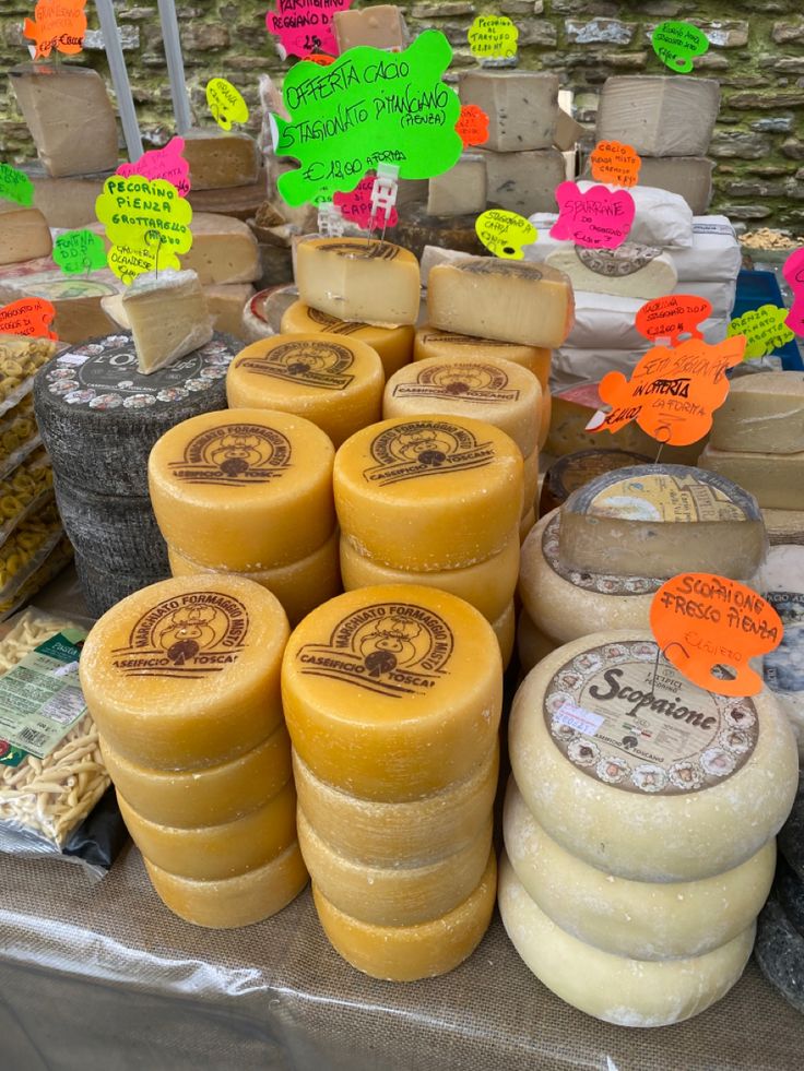 several different types of soaps on display at an outdoor market