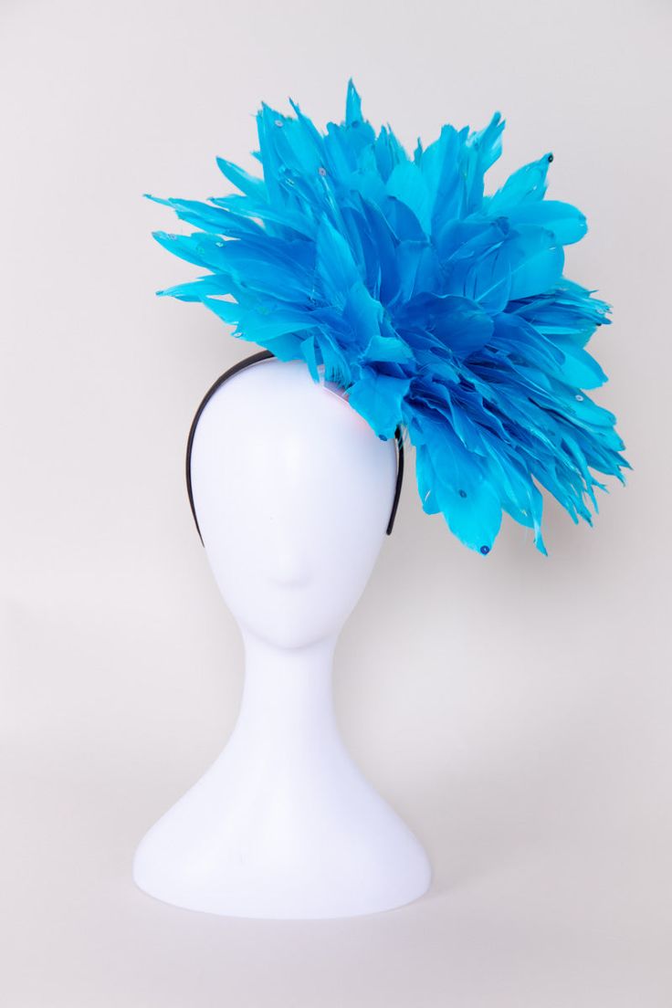 Get ready to party when you wear this fun and fluffy fascinator! Covered in solid bright red-colored feathers and accented with sequins. Pair this with a dress, jumpsuit, or romper for your next event! NO RETURNS/EXCHANGES due to the nature of the product (special occasions and headwear). Not all screens/lighting are created equal. Make sure you are happy with the color match before ordering! If you have any concerns, let us know! All Sales Final on Hats and Fascinators. Colors will vary with di Ostrich Feather Headpiece For Kentucky Derby Party, Ostrich Feather Headpieces For Kentucky Derby Party, Kentucky Derby Ostrich Feather Headpiece For Party, Fitted Party Headpiece With Ostrich Feathers, Summer Party Feather Headpieces, Summer Party Headpiece With Feathers, Summer Party Headpieces With Feathers, Party Headpieces With Ostrich Feather Trim, Summer Party Feather Trim Fascinator