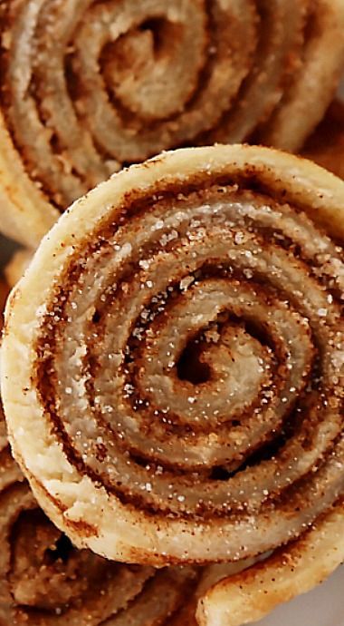 cinnamon rolls stacked on top of each other