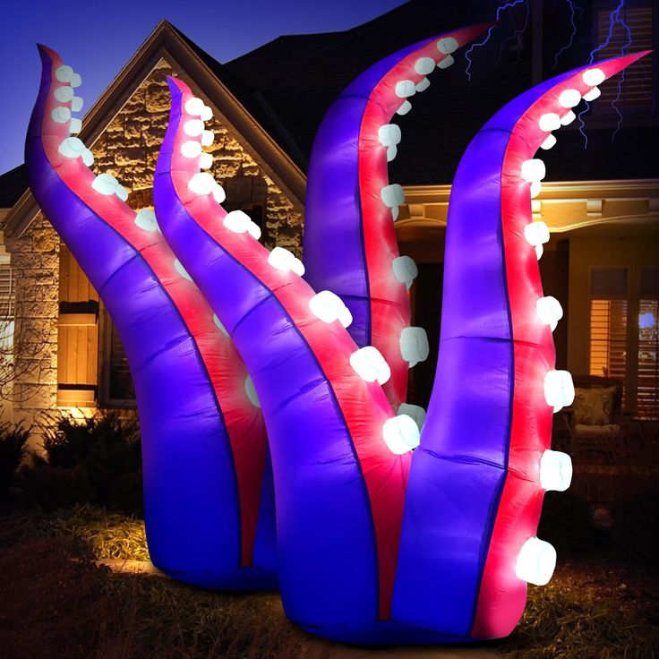 an inflatable sculpture with red, white and blue lights