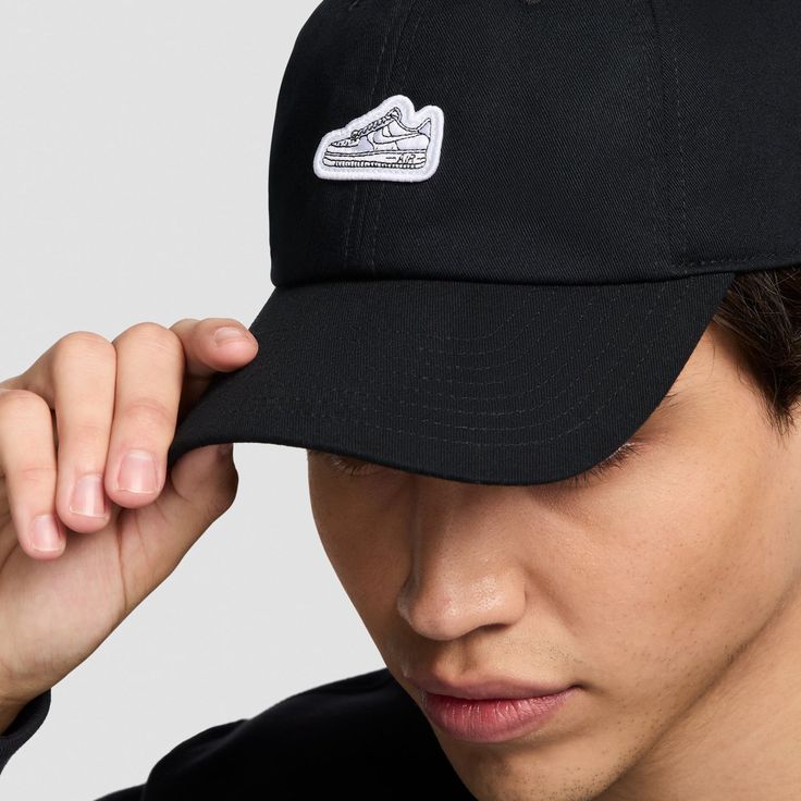 If you own enough Nike kicks that you've lost count, you need the Nke Club Cap AF1 Patch Strapback Cap. They feature a sewn-on patch with a Nike sneaker on the front (Don't worry, it won't clash with your sneakers with its white color). And the bent, traditional-style bill gives it that old-school vibe. Strapback (adjustable). Curved bill. Features Nike shoe patch on front. Nike Breathable Baseball Cap With Curved Brim, Nike Casual Sports Trucker Hat, Nike Casual Trucker Hat For Sports, Casual Nike Breathable Hat, Black Dad Hat For Streetwear With Curved Bill, Black Urban Dad Hat With Curved Bill, Urban Black Dad Hat With Curved Bill, Nike Casual Baseball Cap Breathable, Nike Casual Snapback Hat For Baseball Season