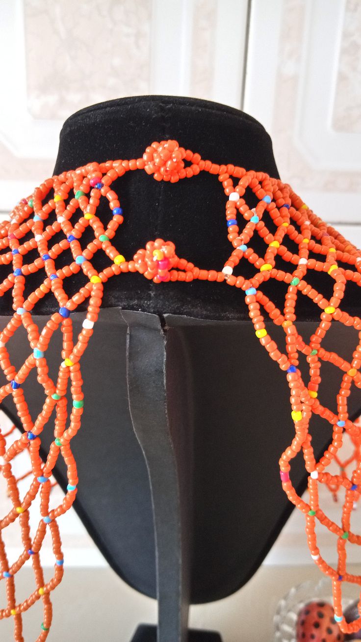 African Beaded wedding necklace, Zulu Cape necklace, Beaded shawl necklace, Christmas gift for her, Women jewelry, Bridesmaid gift This beaded bib necklace is superbly crafted which can be worn with any outfit at different occasions and it will absolutely makes you stand out. Main color - orange. The necklace can be available in different colors. Wholesale available at a fair price,please contact me. For any clarification,please send me a convo or an e-mail. Thank you for visiting and happy shop Bohemian Colorful Beads For Wedding, Bohemian Beaded Necklaces With Dangling Beads For Weddings, Bohemian Beaded Necklaces With Round Beads For Wedding, Bohemian Beaded Necklaces With Large Beads For Weddings, Bohemian Beaded Necklace With Round Beads For Wedding, Bohemian Beaded Necklace With Dangling Beads For Wedding, Bohemian Beaded Necklaces For Wedding, Bohemian Beaded Necklace For Wedding, Bohemian Tiny Beads For Wedding