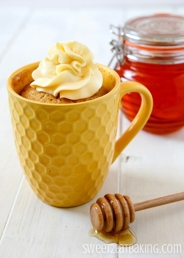 a honey mug cake with whipped cream on top