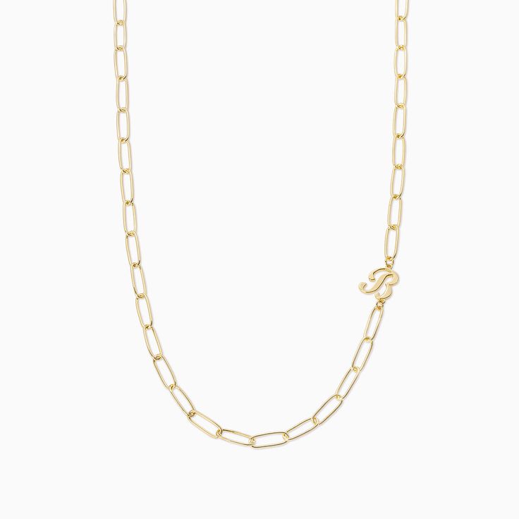 Want a letter necklace that makes styling easier than ever before? Meet our Cursive Initial Necklace. Coming in silver and gold, this initial necklace features a large link chain and a cursive letter. For a necklace stack our stylists love, pair this letter and chain necklace with our Soft Touch Lariat Necklace, Ready to Mingle 2.0 Necklace, and Teardrop Pendant Necklace. A Letter Necklace, Uncommon James, Initial Necklace Silver, Chain Letter, Necklace Stack, Cursive Letters, Initial Necklace Gold, Teardrop Pendant, Letter Necklace