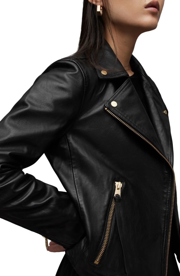 Smooth, rich leather secures the style-staple status of this biker jacket in a classic silhouette with all the timeless moto details. Asymmetric zip closure Notched lapels Zip cuffs Front zip pockets Lined Leather Professional leather clean Imported Casual Luxury Allsaints Leather Jacket, Luxury Allsaints Leather Jacket, Allsaints Long Sleeve Biker Leather Jacket, Allsaints Black Leather Jacket Long Sleeve, Allsaints Leather Biker Jacket With Zipper Closure, Leather Biker Jacket, Leather Cleaning, Classic Silhouette, Biker Jacket