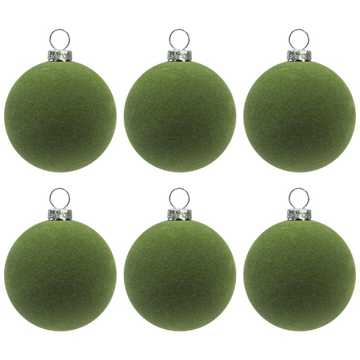 six green christmas balls with silver bows on each ornament, isolated against a white background