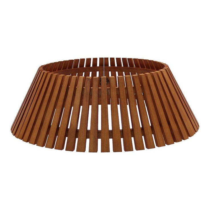 Finish the look of your tree with this St. Nicholas Square Slated Wood Tree Collar. Finish the look of your tree with this St. Nicholas Square Slated Wood Tree Collar. FEATURES For indoor useDETAILS 8.38"H X 26.38"W X 26.38"D 5.32 lbs. Solid wood Vertical display Assembly required Wipe clean Imported Model No. 44STXXTC13 Size: One Size. Color: Natural. Gender: unisex. Age Group: adult. Wood Tree Skirt, Wood Tree Collar, Tree Collar Christmas, Coastal Christmas Tree, Christmas Collar, Tree House Decor, Tree Collar, Coastal Christmas, Wood Tree