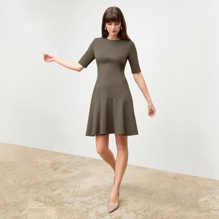 The sleeved cousin of the Jayde dress , the Gina features upper arm coverage, a subtly flouncy, flared skirt, and a just-above-the-knee hemline. Other design details include a classic crew neck and a drop-waist seam. Made in China with fabric from Italy. Mm Lafleur, Ponte Dress, Work Style, Dress Watch, Flared Skirt, Women Supporting Women, Drop Waist, Work Fashion, Style Board