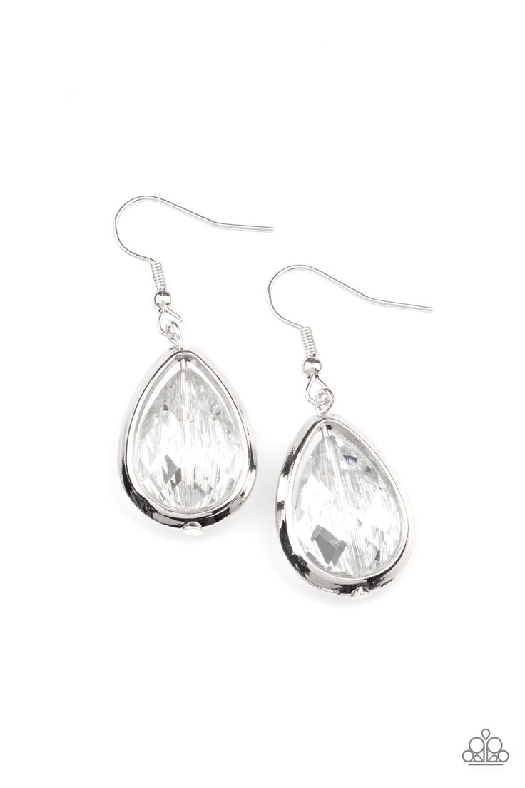 Featuring a reflective metallic back, a glittery rhinestone gem is threaded along a rod inside a silver teardrop casing, creating a glamorous lure. Earring attaches to a standard fishhook fitting.

 Sold as one pair of earrings. Silhouette Earring, Dainty Band, Mobile Boutique, Coil Bracelet, Holiday Sparkle, Paparazzi Accessories, Paparazzi Jewelry, White Earrings, Silver Drop Earrings