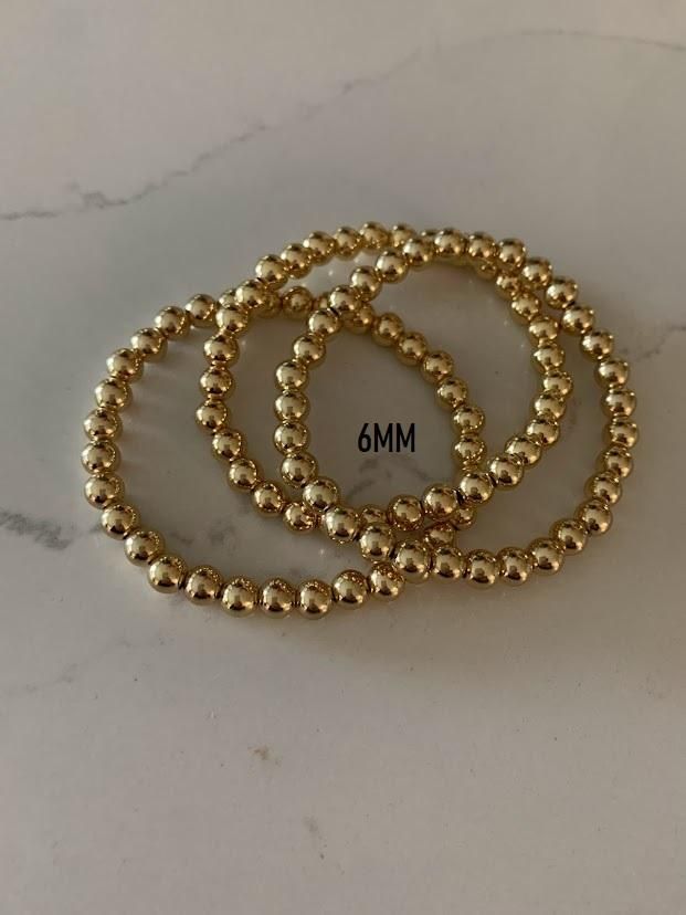 14K Gold Filled 3MM, 4MM, 5MM and 6MM Beads Bracelet •Gold Bracelet •Gold Filled Bracelet•Cuban Link Bracelet•Gold Filled•Oro Laminado• Gold Beads Bracelet --------------------------------------------------------------------------------------------- These beautiful bracelets are great to create an arm party effect. They come available in 14K Gold Filled. ♦ Materials: 14K Gold Filled ♦ Available colors: Gold ♦ Bracelet Length: They are small and stretchable, available in 3MM, 4MM, 5MM & 6MM ♦ Gold Stretch Bracelet With Polished Beads, Gold Beaded Bracelets With Polished Beads For Everyday, Gold Beaded Round Charm Bracelet, Gold Beaded Bracelets With Polished Beads, Gold Beaded Bracelets With Round Beads, Gold Stackable Beads For Gifts, Stackable Gold Rosary Bracelet With Round Beads, Gold Hand-strung Beaded Bracelets, Gold Stackable Rosary Bracelet With Round Beads