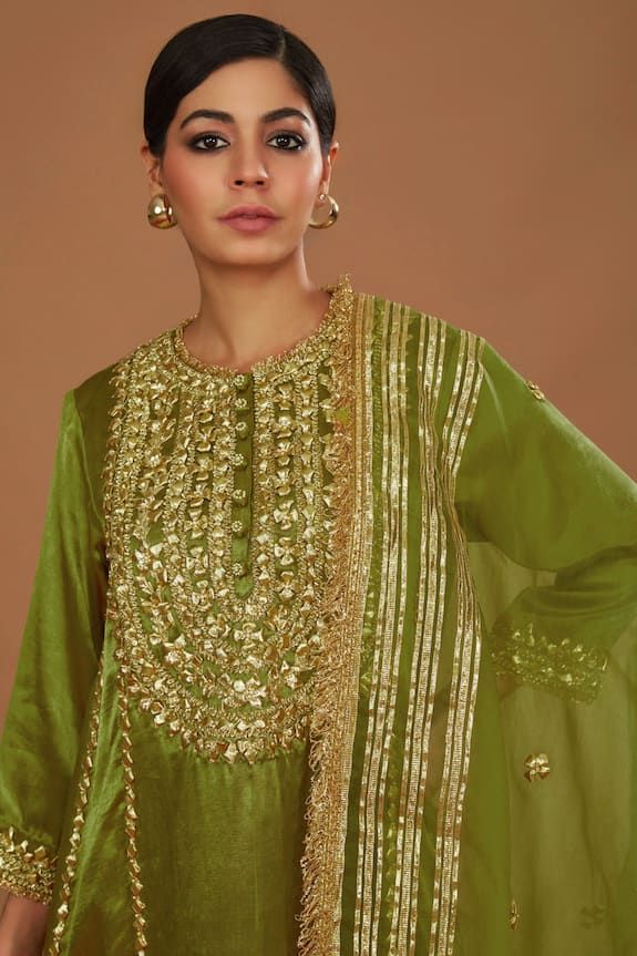 Olive green silk anarkali with gota, sequins and pearls hand embroidery. Comes with salwar and an organza dupatta. - Aza Fashions Green Kundan Sharara For Eid, Semi-stitched Green Salwar Kameez With Dori Work, Bollywood Style Green Sharara With Mirror Work, Green Dola Silk Sharara With Mirror Work, Designer Kundan Palazzo Set For Festivals, Green Dola Silk Palazzo Set With Mirror Work, Gold Churidar With Mirror Work And Straight Kurta, Bollywood Style Silk Kurta With Zari Work, Designer Bollywood Silk Churidar