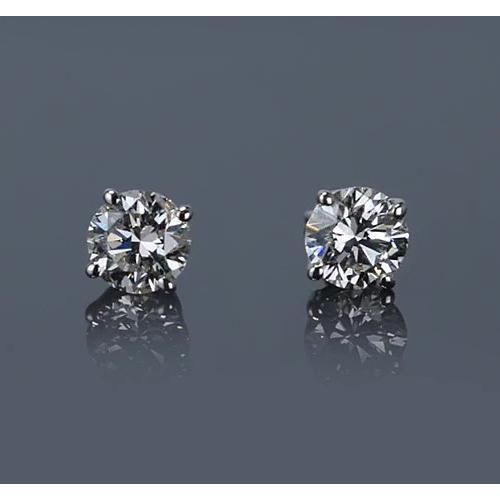 METAL SPECIFICATIONS White Gold 14K STONE SPECIFICATIONS Stone Name : Diamond Stone Cut : Round Stone Details : There is one round cut diamond approx. 0.60 carats (Approx. Diameter 5.2 mm) in each earring. Natural earth mined diamonds. Total : Approx. 1.20 Carats Color : F Clarity : VS1 EARRING SPECIFICATIONS Appraised Value : $4248 .00 Comes with Certificate Round Diamond Earrings, Vs1 Diamond, Diamond Earrings Studs Round, Engagement Ring Photos, Halo Earrings Studs, Round Diamond Engagement Rings, White Gold Diamond Rings, Natural Earth, Diamond Stud