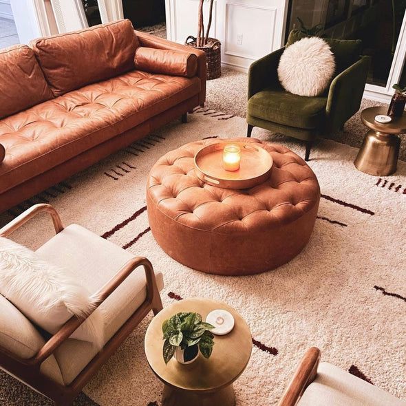 a living room filled with lots of furniture