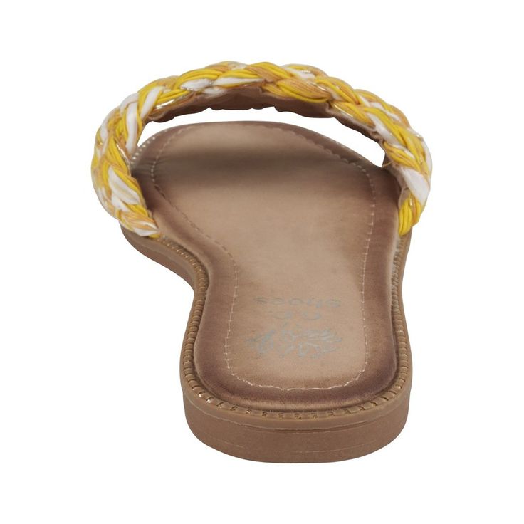 Add a touch of flair to your summer outfits with the Arly sandal by GC Shoes. Its timeless design is enhanced by intricate woven details, adding texture and visual interest. With a padded footbed, these sandals guarantee utmost comfort as you take each step in style. Perfect for warm weather ensembles. Braided Summer Flip Flops, Flat Woven Synthetic Sandals, Adjustable Yellow Synthetic Flip Flops, Yellow Slide Sandals In Synthetic Material, Yellow Synthetic Flip Flops With Cushioned Footbed, Yellow Cushioned Synthetic Flip Flops, Flat Heel Synthetic Sandals With Woven Leather, Synthetic Woven Leather Flat Sandals, Yellow Synthetic Slides For The Beach