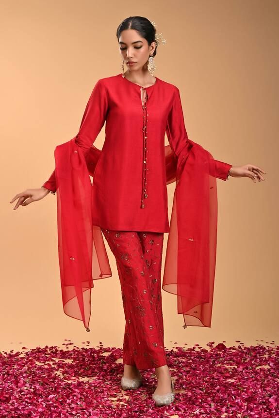 Red full sleeves kurta with ghungroo dori tie-up detail. Paired with a floret embroidered pant and a dupatta. - Aza Fashions Ethnic One Piece Dress, Red Suit Designs Indian Style, Elegant Palazzo Set With Tassels, Elegant Festive Palazzo Set With Tassels, Elegant Saree Set With Tassels, Traditional Party Sets With Set-in Sleeves, Designer Elegant Sharara With Tassels, Elegant Designer Wear Sharara With Tassels, Elegant Sets With Tassels For Diwali