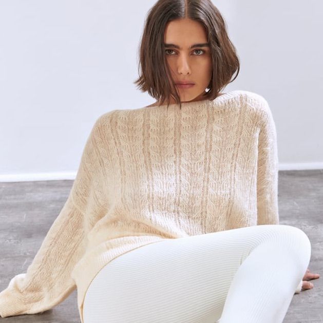 Boatneck Long Sleeve Sweater. Ecru | Beige Crew Neck Soft Knit Sweater, Beige Soft Knit Crew Neck Sweater, Cream Long Sleeve Soft Knit Sweater, Cream Soft Knit Long Sleeve Sweater, Cozy Beige Crew Neck Sweater, Beige Crew Neck Soft Knit Outerwear, Beige Relaxed Fit Sweater For Winter, Beige Soft Knit Outerwear With Crew Neck, Beige Crew Neck Outerwear With Soft Knit