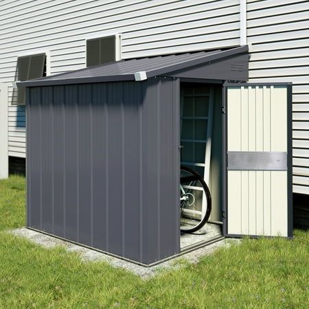 an outdoor storage shed with the door open