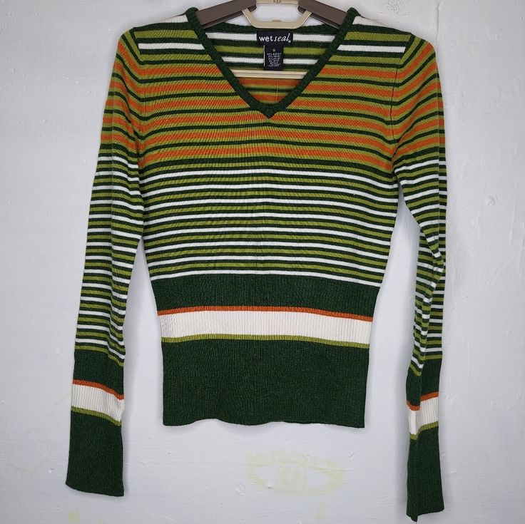 Wet Seal V-Neck Sweater Womens Jrs Small Green Orange Rib Knit Stripe Long Sleeve Banded Waist New With Tag 49% Acrylic, 21% Rayon, 30% Nylon 32" Bust, 20" Length Size Small By Wet Seal. Retro V-neck Winter Tops, Y2k V-neck Sweater For Fall, Retro V-neck Stretch Top, Green V-neck Y2k Tops, Trendy Orange V-neck Sweater, Retro Green V-neck Sweater, Fitted Striped V-neck Sweater, Y2k V-neck Fall Sweater, Y2k Style V-neck Sweater For Fall