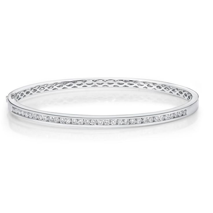 Memoire 18k white gold 58x52mm bangle bracelet with 33 channel set diamonds weighing .95cts , hinged clasp 18k White Gold 58x52MM Channel set 33 Diamonds = .95cts GH-SI quality Hinged Clasp Channel Set Round Cut Diamond Bracelet, Formal Diamond Tennis Bracelet Channel Set, Diamond White Channel Set Diamond Bracelet, Timeless Diamond Bracelet With Channel Set For Formal Occasions, Channel Set Diamond Bracelet For Anniversary, Fine Jewelry Diamond White Diamond Bracelet With Channel Set, Anniversary White Gold Channel Set Diamond Bracelet, Timeless Channel Set Diamond Bracelet For Formal Occasions, Timeless Channel Set Diamond Bracelet For Formal Events