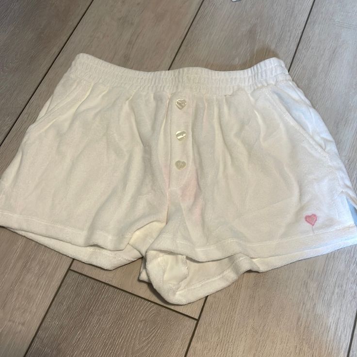 Nwt Stoney Clover Lane White Terry Cloth Shorts Size Small. Open To Reasonable Offers And Cross Posted On M. Low Offers From Resellers Will Be Declined. White Bottoms With Built-in Shorts, White Cotton Shorts For Loungewear, Cute White High Waist Bottoms, White Cotton Bottoms With Built-in Shorts, White Bottoms For Beach Season Loungewear, Beach Season Loungewear Shorts, Loungewear Beach Season Shorts, Casual White Beach Bottoms, Casual White Shorts With Built-in Liner