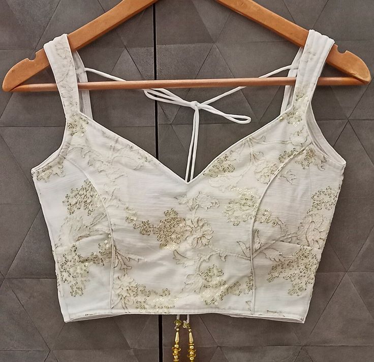 1. Beautiful floral embroidery readymade blouse.  Ready to Wear  2. Get blouse with your measurement. Send your measurement with order. 2. Available in All size.  Size in inch 30", 32", 34", 36", 38", 40", 42", 44", 46", 48".  We also accept custom design.  View More   https://www.etsy.com/in-en/shop/readymadeblouse               3. High qualify material with perfect fitting. 4. We accept payment by Paypal.  5. We deliver 1-2 days after received payment. 6. We also accept custom orders and bulk Fitted Embroidered Crop Top For Wedding, Sleeveless Padded Crop Top For Wedding, Festive Sleeveless Wedding Crop Top, Wedding Sleeveless Blouse Choli With Floral Embroidery, Wedding Crop Top With Zari Work, Floral Embroidered Sleeveless Choli For Wedding, Wedding Sleeveless Choli With Floral Embroidery, Wedding Choli With Floral Embroidery Sleeveless, Wedding Sleeveless Choli With Self Design