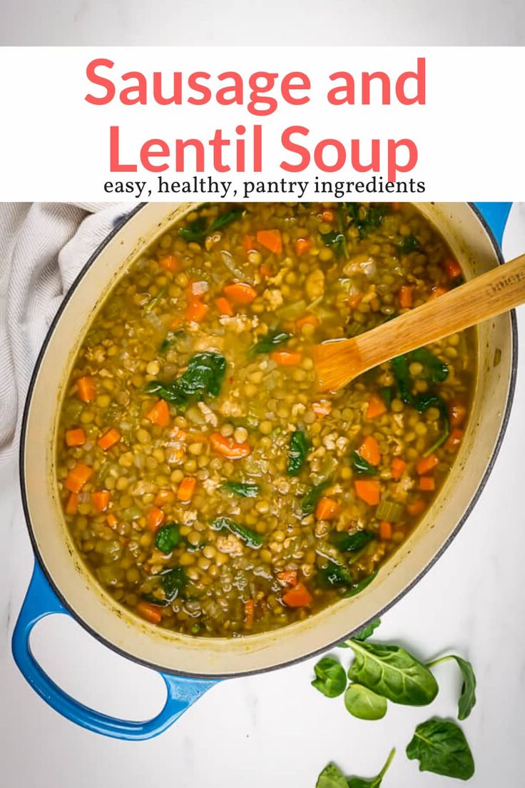 a pot filled with soup and vegetables on top of a white countertop next to a wooden spoon