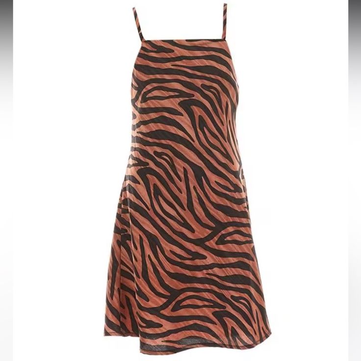 From Gb, This Dress Features: Animal Print Square Neckline Sleeveless Mini Length A-Line Silhouette Polyester Blend Machine Wash/Tumble Dry Sleeveless Brown Tiger Print Dress, Brown Sleeveless Tiger Print Dress, Casual Sleeveless Tiger Print Dress, Casual Brown Tiger Print Dress, Casual Black Tiger Print Dress, Casual Black Dress With Tiger Print, Animal Print Mini Dress, M Girl, Classic Wardrobe Staples