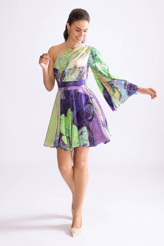 Green and purple short dress with daisy orchid print. - Aza Fashions Spring A-line One Shoulder Cocktail Dress, Chic Mini Dress With Floral Print And Asymmetrical Neckline, Purple One-shoulder Cocktail Dress, Chic One-shoulder Floral Print Cocktail Dress, Chic One Shoulder Floral Print Cocktail Dress, Fitted Floral Print One Shoulder Dress, Summer Silk Fitted One-shoulder Dress, Summer Silk Fitted One Shoulder Dress, Multicolor Floral Print One-shoulder Mini Dress