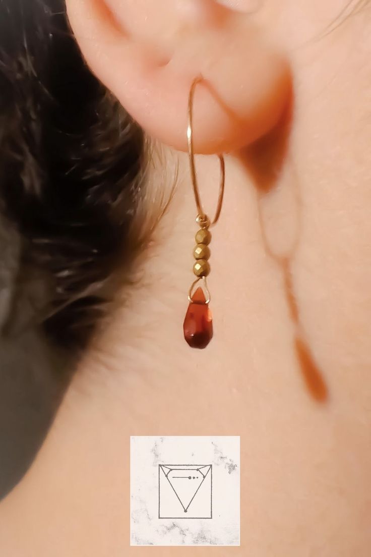 Looking for a dash of elegance? With these handmade small hoop earrings with red garnet and gold plated hematite gemstones, dangling from 14k yellow gold filled hoops you can easily elevate your everyday or evening outfit to the next level. Minimalist with a touch of dainty glamour, these earrings are a perfect jewelry gift. Full length is 3.9 cm or 1.5 inch. #MakeItMeaningful #jewelrygift #Couragemme Red Drop Earrings For Everyday Wear, 14k Gold Filled Nickel-free Drop Jewelry, Garnet Drop Jewelry For Gift, Handmade Everyday Drop Jewelry, Gift Garnet Drop Jewelry, Everyday Handmade Drop Jewelry, Dainty Drop Hoop Earrings For Gift, Nickel-free 14k Gold-filled Drop Jewelry, Nickel-free 14k Gold Filled Drop Jewelry