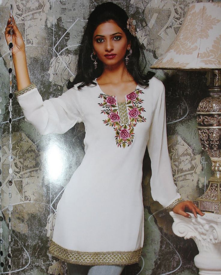 Bohemian Kurta With Embroidered Neckline For Navratri, Bohemian Dress With Embroidered Neckline For Navratri, Bohemian Navratri Dress With Embroidered Neckline, White Tunic With Resham Embroidery, White Resham Embroidered Tunic, White Bollywood Tunic Kurta, White Resham Embroidery Tunic, White Long Sleeve Tunic For Eid, White Long Sleeve Eid Tunic