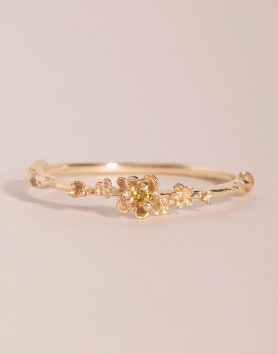 A flurry of sweet little buttercups and yellow sapphires, a little garden in a ring. Elegant Yellow Flower Shaped Ring, Yellow Flower Ring For Anniversary, Yellow Flower Ring For Wedding, Yellow Flower Wedding Rings, Buttercup Ring, Gold Jewelry Gift, Little Garden, Yellow Sapphire, Dainty Ring