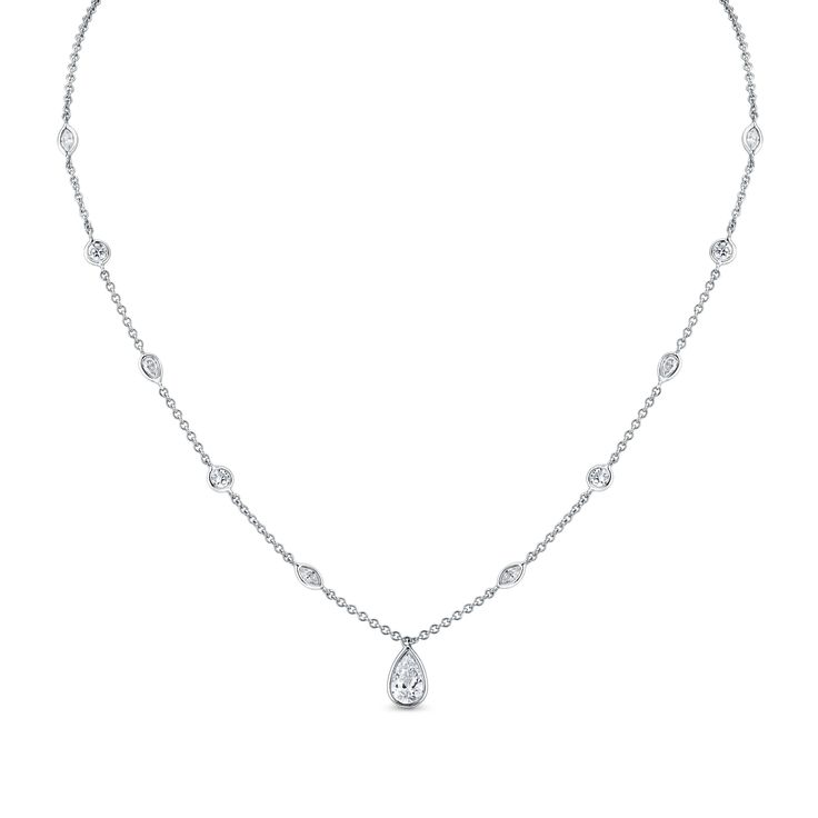 Experience sophistication with our Certified 18k Station Necklace adorned by a stunning Pear Shape Diamond Pendant. Crafted in luxurious 18k gold, this pendant features a captivating pear-shaped diamond certified for its brilliance and quality. The timeless design of this necklace exudes elegance and grace, perfect for any occasion. Classic Diamond Pear-shaped Necklace, Pear-shaped Diamond White Necklace With Diamond Accents, Exquisite Pear-shaped Diamond Necklace, Luxury Pear Shaped Diamond Necklace For Anniversary, Timeless Pear-shaped Diamond White Jewelry, Timeless Pear-shaped Diamond Necklace For Anniversary, Luxury White Gold Drop Necklaces, Pear-shaped Brilliant Cut Diamond White Necklace, Dazzling Pear-shaped Brilliant Cut Diamond Necklace