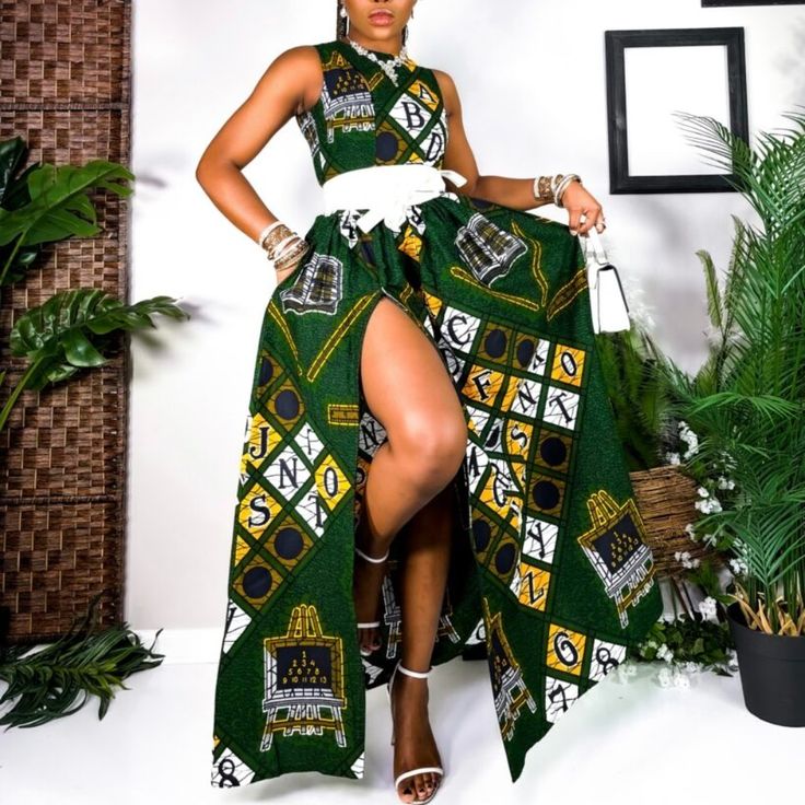 Titilayo Maxi Dress (Women’s Stretchy Dress In African Print/ Ankara/Dashiki African Alphabet Fabric In Green, White And Yellow) African Stretchy Maxi Dress 2 Side Pockets Elastic Thread On The Top Back Of The Dress Top Back Stretches To Fit Bust Slit Adjustable Flare Zipper Slit; Can Be Worn With Or Without The Slit Elastic On Waist Made With High Quality African Print Wax Fabric 100% Cotton Designed In Usa And Made In Nigeria. Occasion: Traditional/ African Wedding Dress, Prom Dress/Dresses, R Traditional African Wedding Dress, African Alphabet, Traditional African Dresses, Traditional African Wedding, African Traditional Wear, African Wedding Dress, African Maxi Dresses, Wax Fabric, Back Stretches